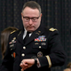 Lt. Col. Alexander Vindman, National Security Council Director for European Affairs, checks his watch as he departs after testifying before the House Intelligence Committee in the Longworth House Office Building on Capitol Hill November 19, 2019 in Washington, DC.